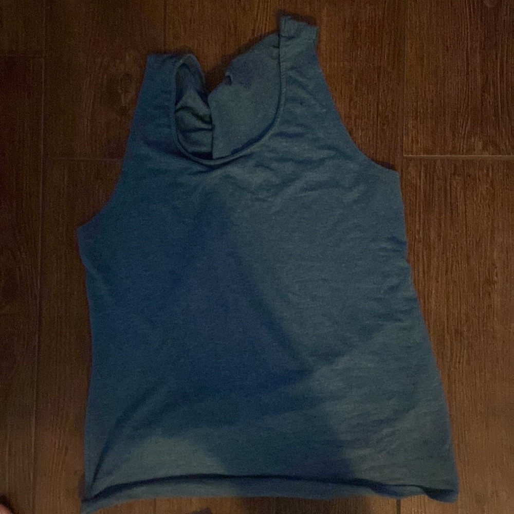 blue tank top, crossed back